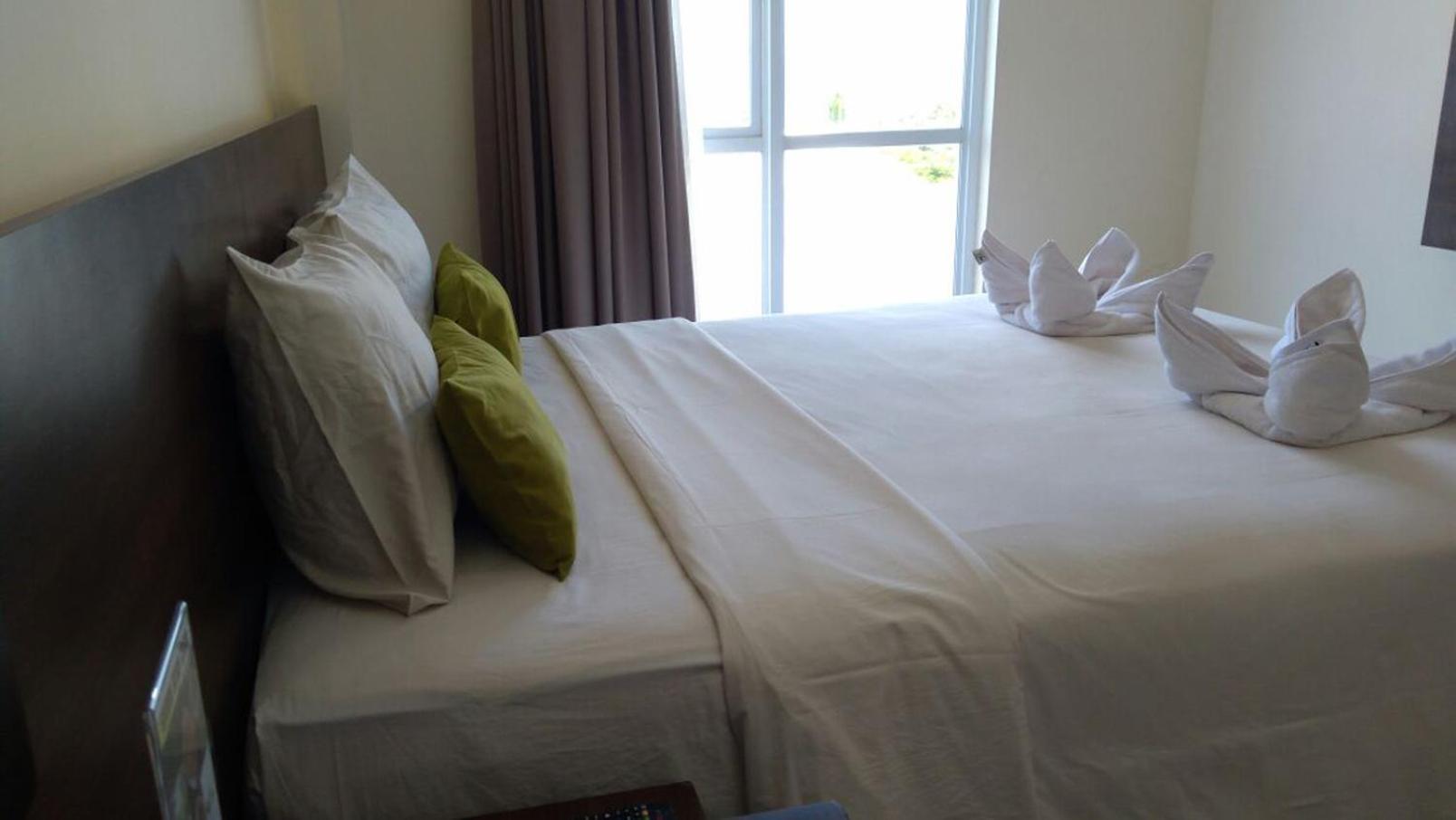 Green Eden Hotel Manado Room photo