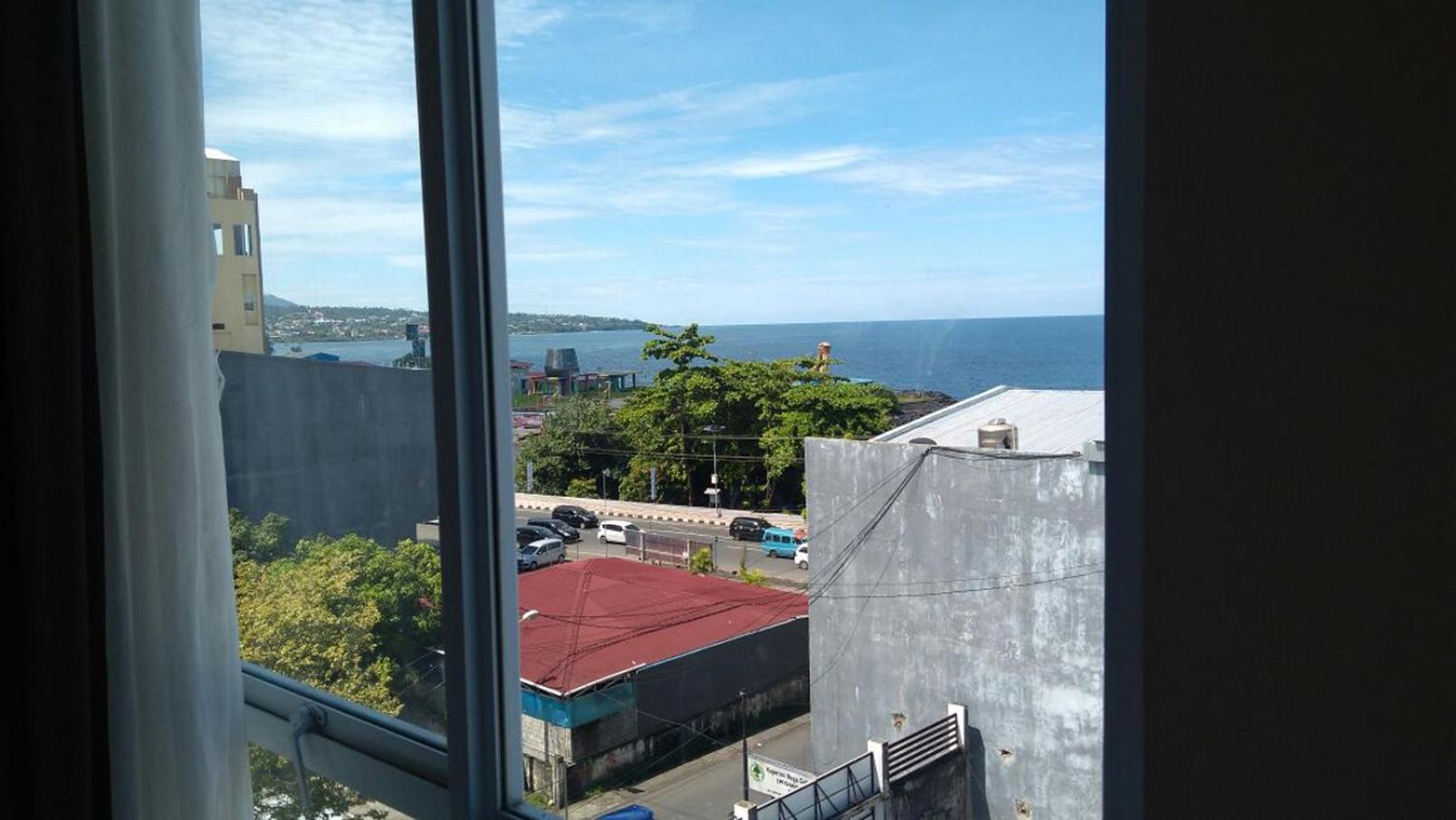 Green Eden Hotel Manado Room photo