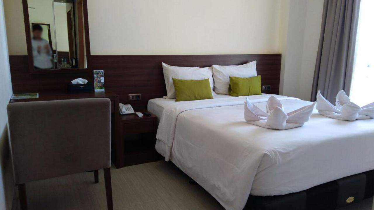 Green Eden Hotel Manado Room photo